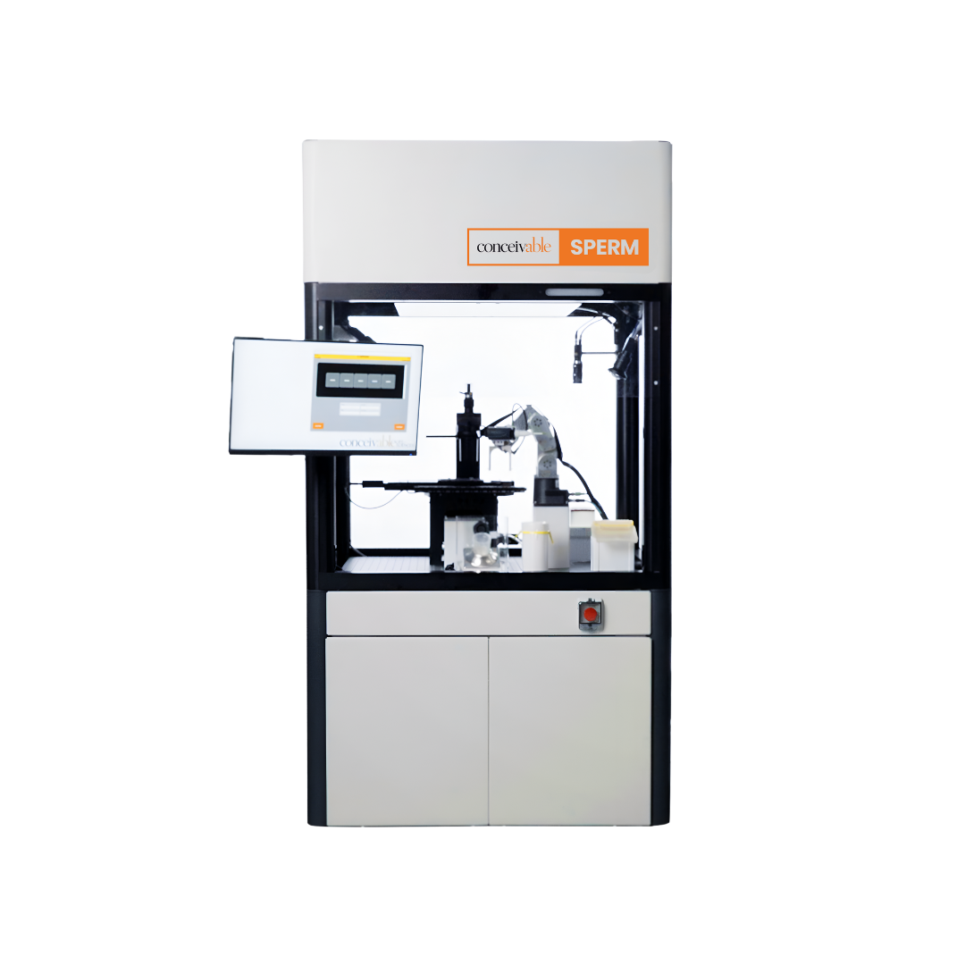Laboratory machine labeled 'conceivable SPERM' used for sperm analysis or artificial insemination, with display screen and robotic arm inside a controlled enclosure.