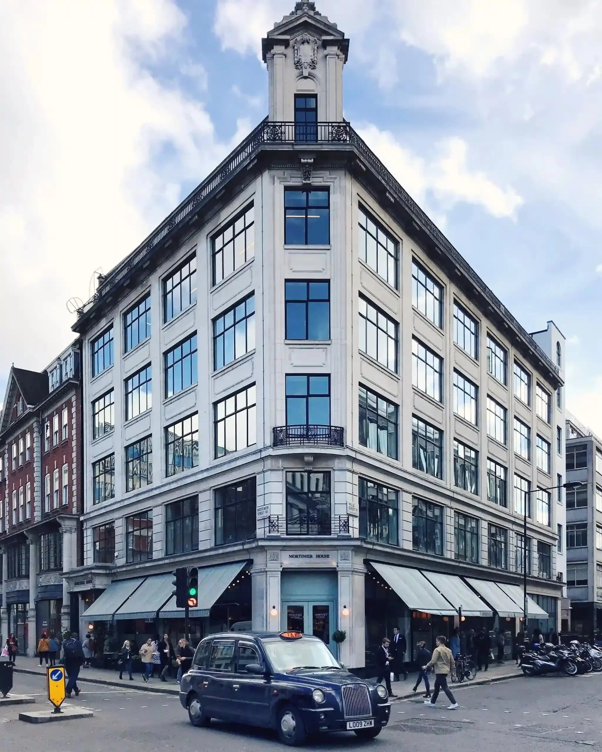 Exterior view of a building in London with classic architectural details